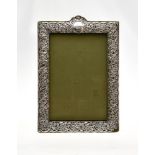 An Edwardian silver mounted large photograph frame by Henry Matthews