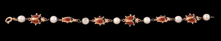 A cultured pearl and enamel ladybird bracelet