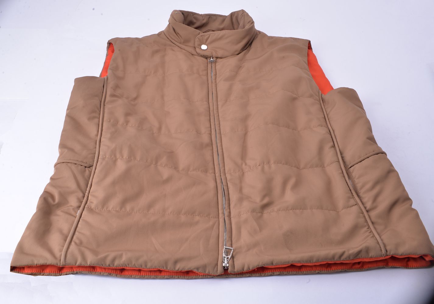 Hermes, a brown gilet body warmer