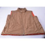 Hermes, a brown gilet body warmer