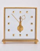 An unsigned brushed brass skeleton clock