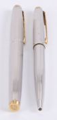 Parker, 75, a silver plated roller ball pen and ball point pen