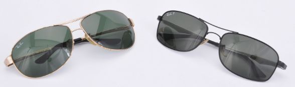 Ray Ban, ref. RB3342 001, a pair of gilt metal framed sunglasses