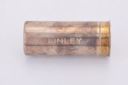 David Linley, a silver novelty shotgun shell coin holder by L J Millington