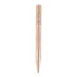 Cartier, a gold coloured combination fountain pen and propelling pencil