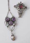 An amethyst and mother of pearl pendant