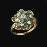 A 1970s emerald and diamond cluster ring