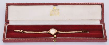 Garrard, Lady's 9 carat gold bracelet watch