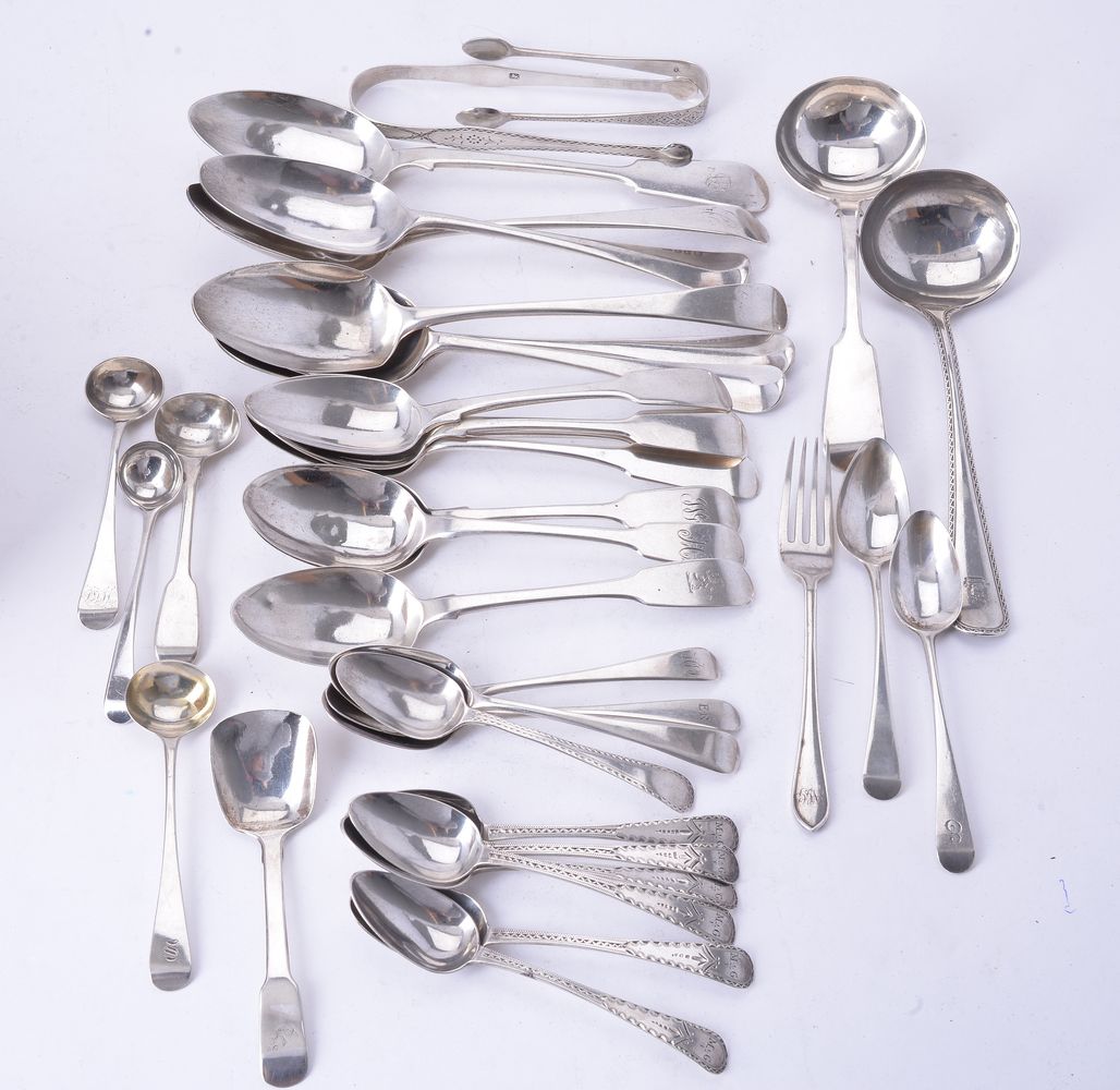 A collection of silver flatware