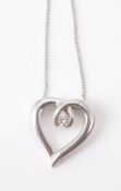 A diamond set heart pendant