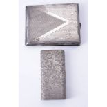 Two Italian silver coloured cigarette cases