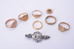 Three signet rings and a wedding band