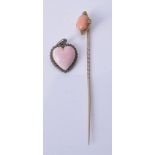 ϒ A coral and diamond stick pin