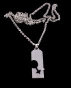 A diamond set tag pendant by Fred