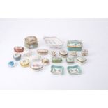 A collection of Continental porcelain boxes and the like