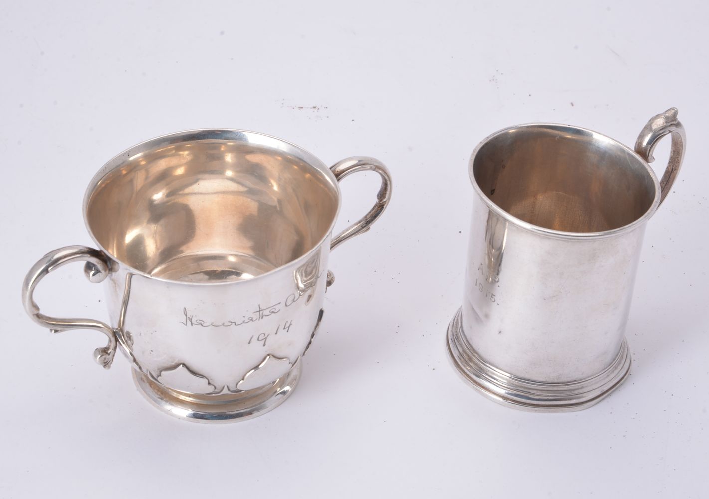 A Victorian silver christening mug and a twin handled porringer