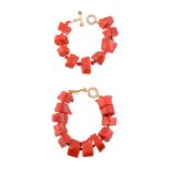 ϒ A pair of stained coral bead bracelets