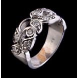 A foliate diamond band ring