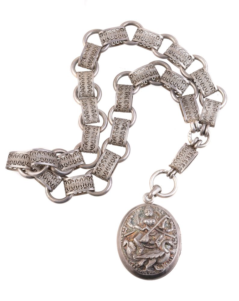 A 19th century South Indian silver locket and collar