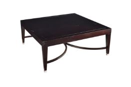 A modern hardwood coffee table of square rom