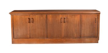 An oak three door side cabinet