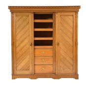 A Victorian pale oak wardrobe