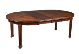 A mahogany D end extending dining table