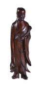 A Chinese carved boxwood figure of a scholar