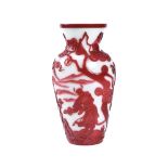 A Chinese overlay ruby-red peking glass vase