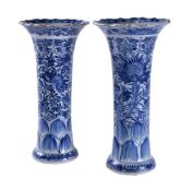 A pair of Chinese blue and white gu vases