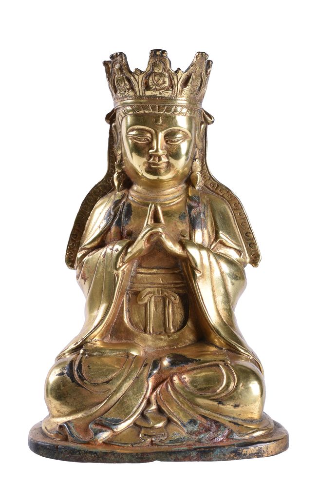 A Chinese gilt-bronze figure of Vairochana