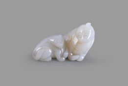 A white and russet jade 'Lion and Cub' pendant