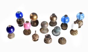 A collection of ten Chinese mandarin hat finials and spare parts