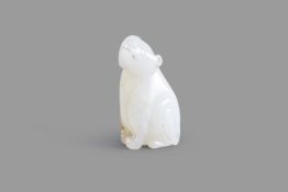 A Chinese white jade carving of a beast