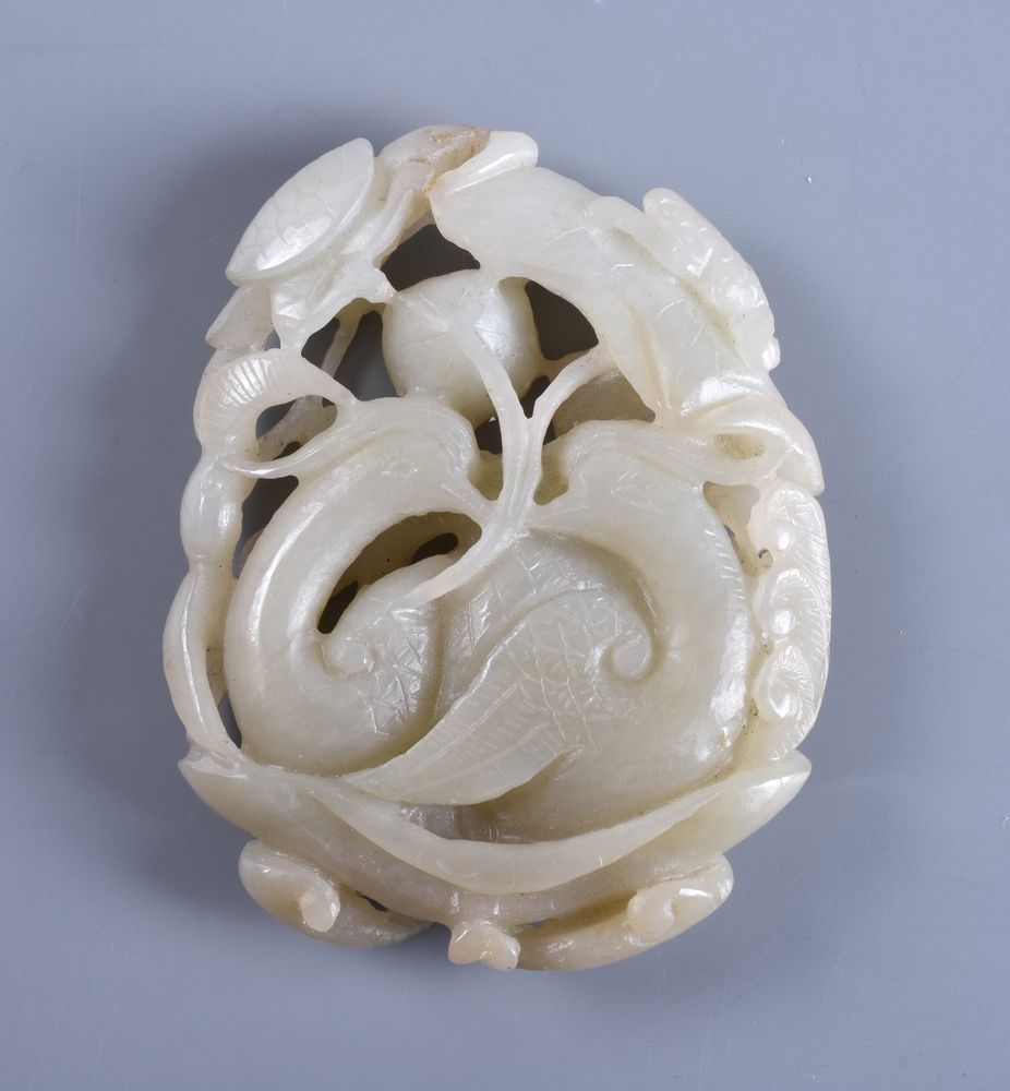 A Chinese celadon 'Fish and Lotus' jade carving - Image 2 of 4