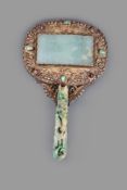 A Chinese Jadeite and silver-gilt hand mirror