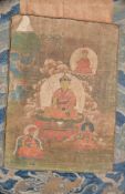 A Thang-ka depicting a Karmapa Lama