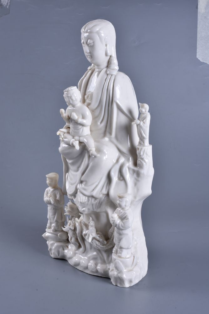 A Chinese Dehua group of Quanyin and child - Image 3 of 11