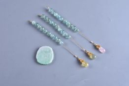 A group of three strings of aquamarine beads for a court necklace