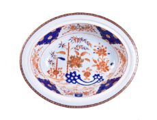 A Chinese Imari armorial dish