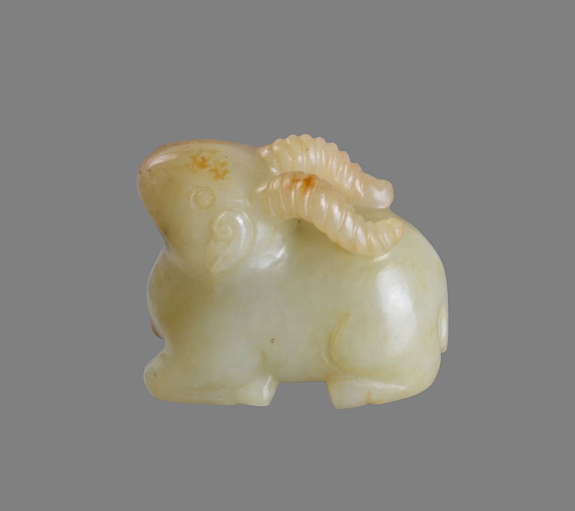 A small celadon and russet jade carving of a ram - Image 2 of 3