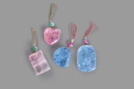 A group of four tourmaline and aquamarine pendants