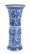 A large Chinese blue and white beaker vase