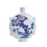 A Chinese blue and white and underglaze red moon flask