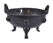 A Chinese bronze tripod censer