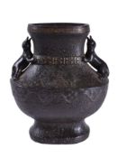 A Chinese gilt cast iron vase