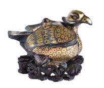 A Chinese archaic style gilt bronze bird box and cover