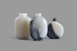 A group of three Chinese jade snuff bottles