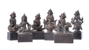 A rare group of six small bronze Nepalese figures of deities