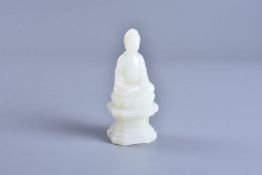 A white jade figure of buddha